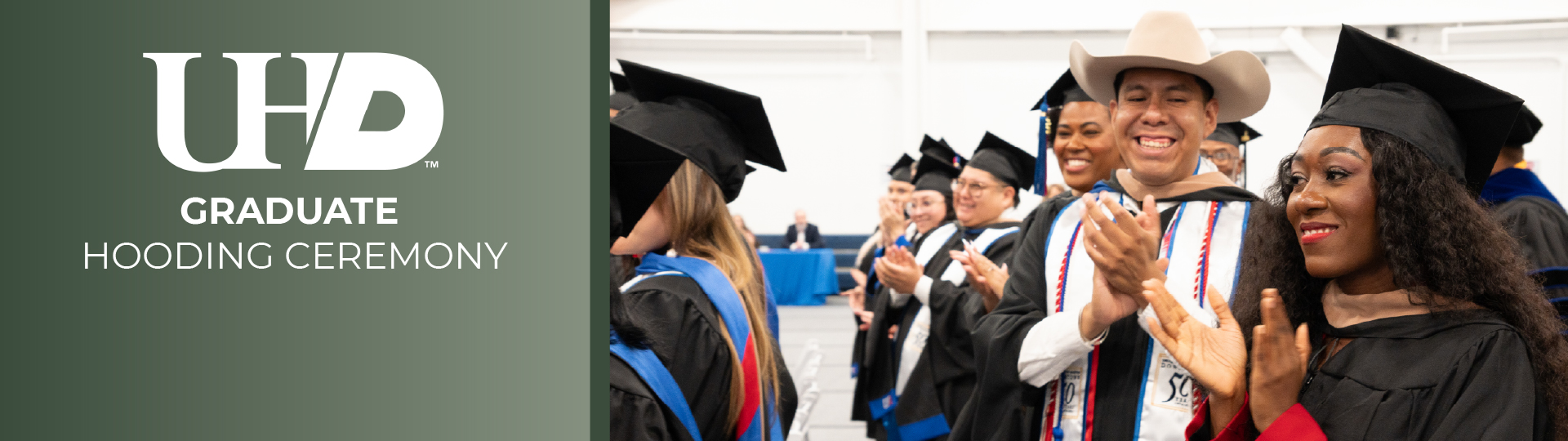 students celebrating at the hooding ceremony