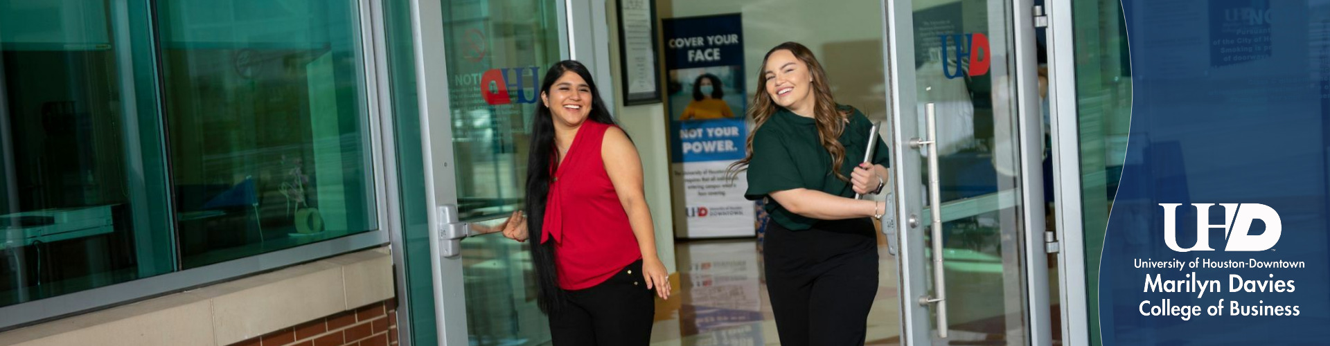 Female student talking to another student