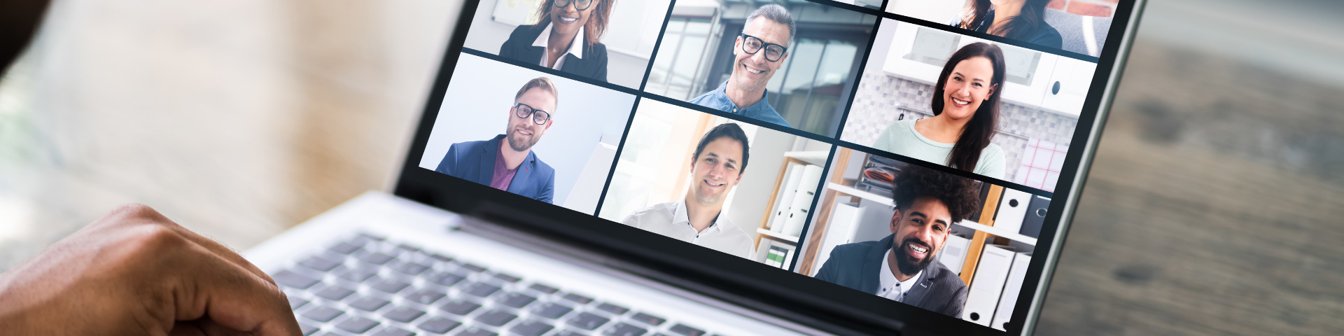 virtual meeting with students shown on a laptop