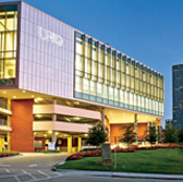 UHD welcome center building at night