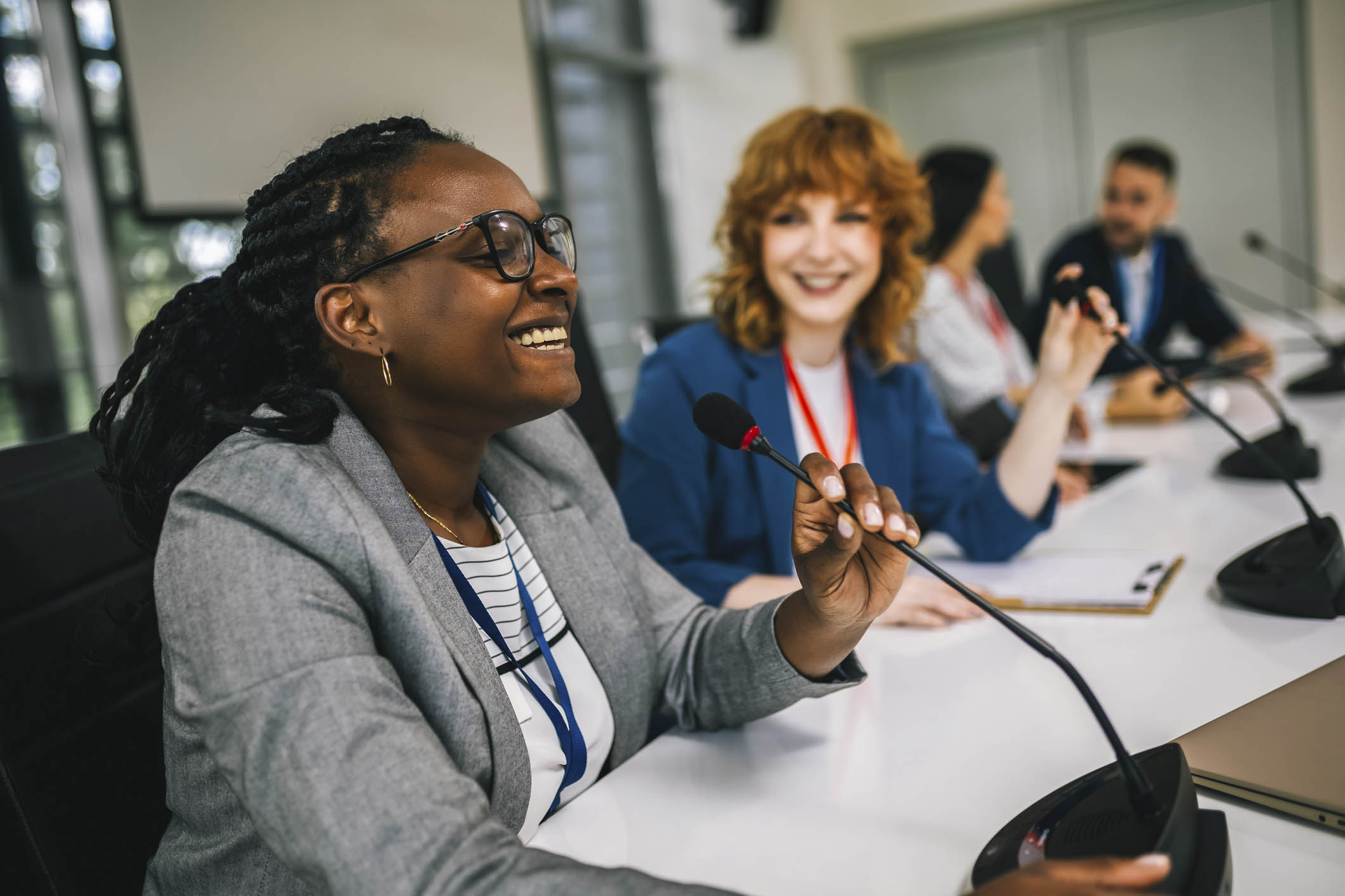 Student on a Panel with a Mic