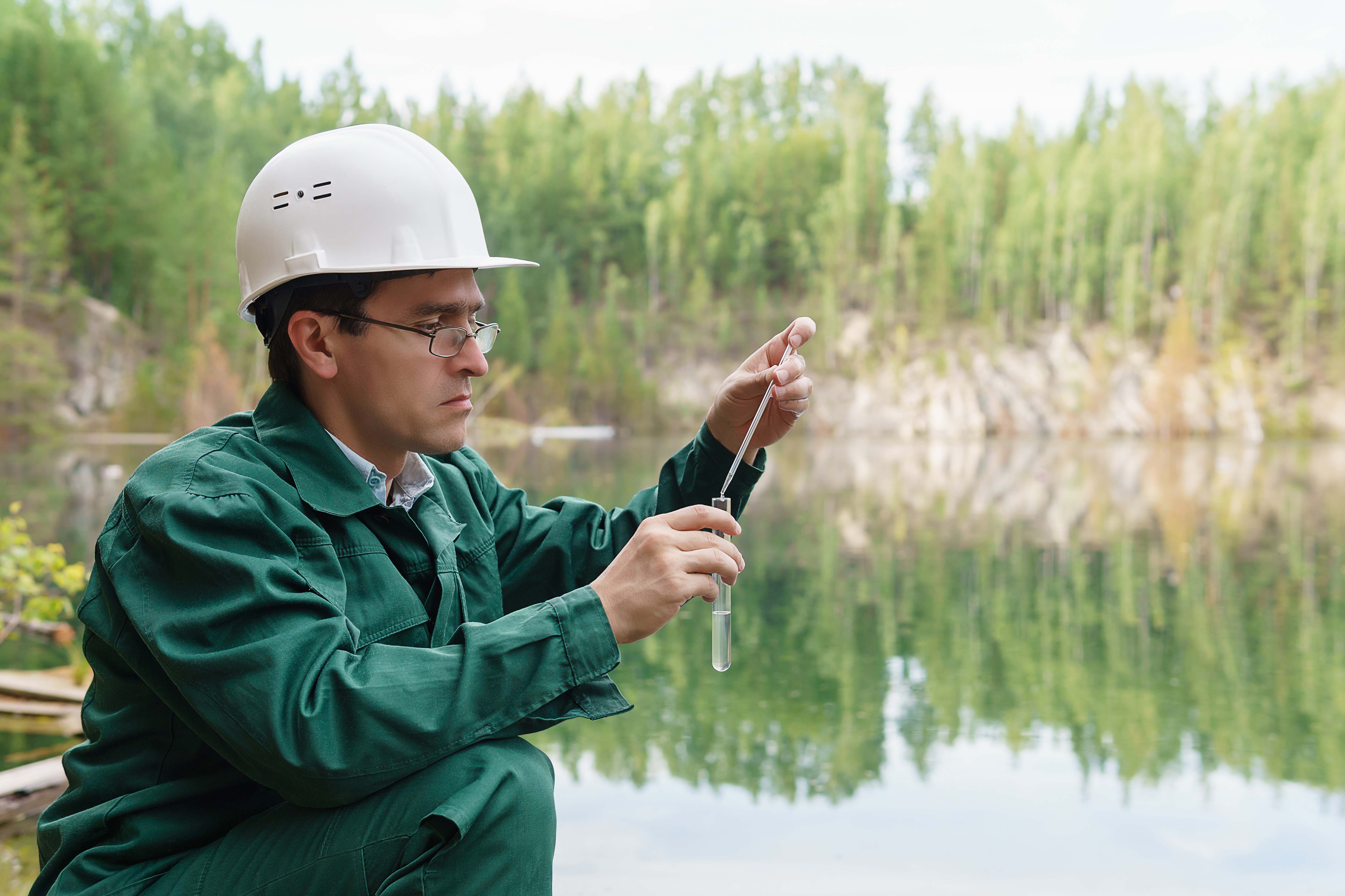 Researcher taking water Samples