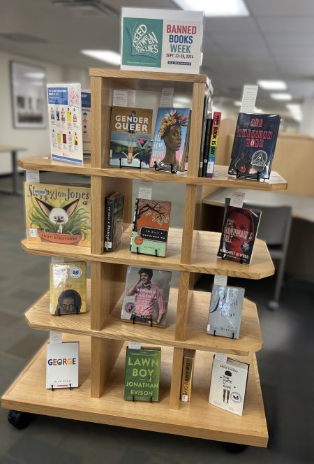 W.I. Dykes Library book display with several banned or challenged books.