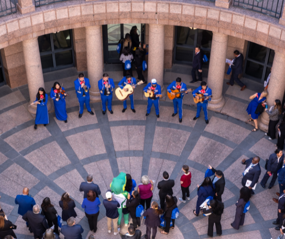 UHD mariachi group plays at state capitol while audience watches