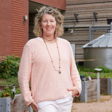 Director of the University of Houston-Downtown's Center for Urban Agriculture and Sustainability, Dr. Lisa Morano, in the university's sustainability garden. 